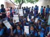 Children from the snake charmer community played ‘Snakes and Ladders’ based on child rights
